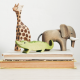 wooden animals on a book