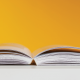 open book with orange background