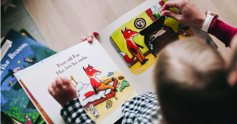 child reading a picture book