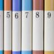 A lineup of books numbers 2 through 11