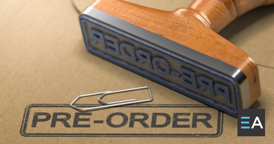 A rubber stamp with the word "pre-order" on it