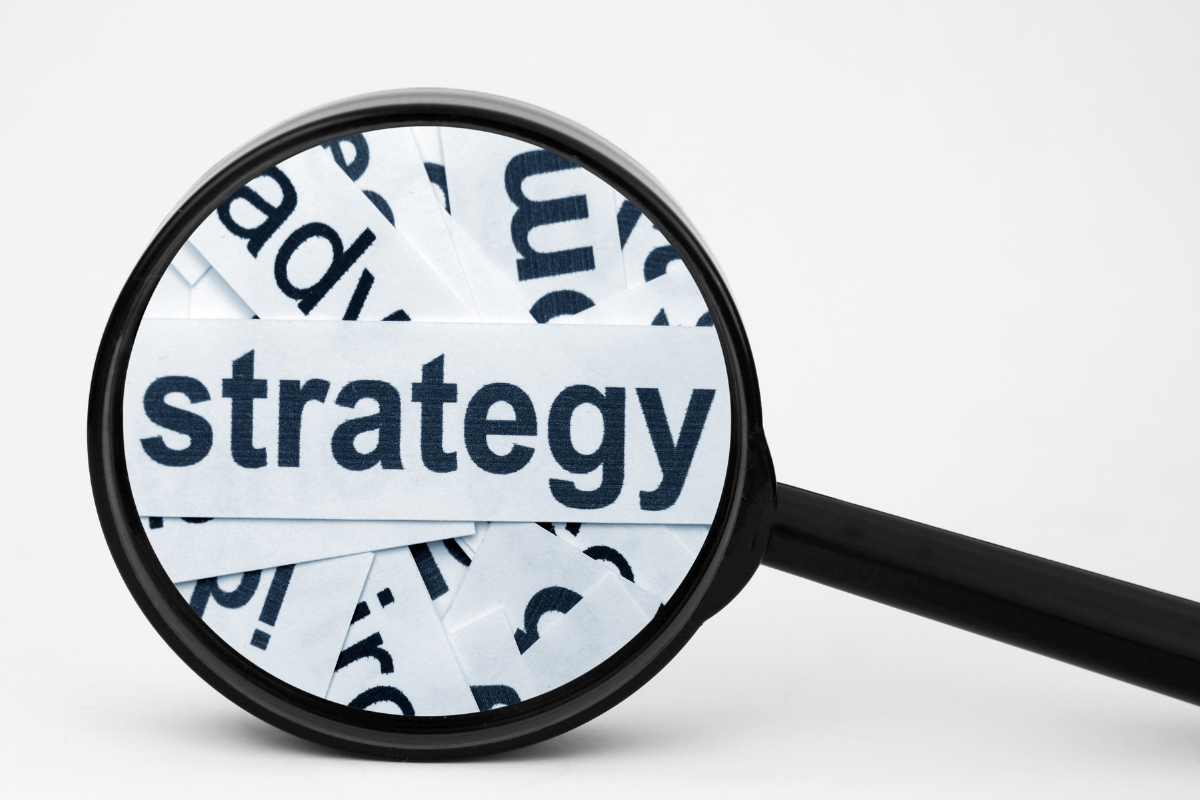 A magnifying glass showing the word strategy