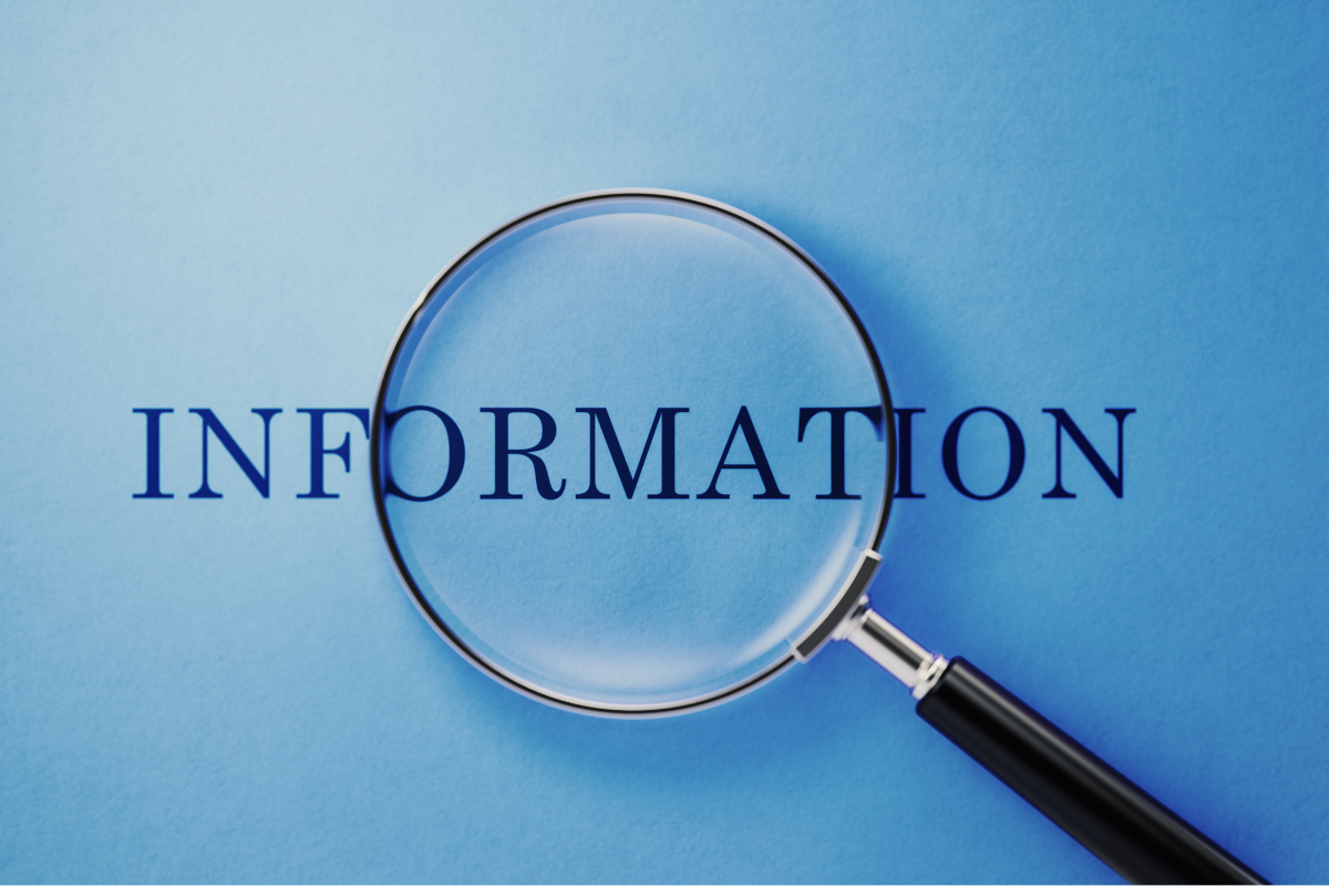 A magnifying glass over the word information