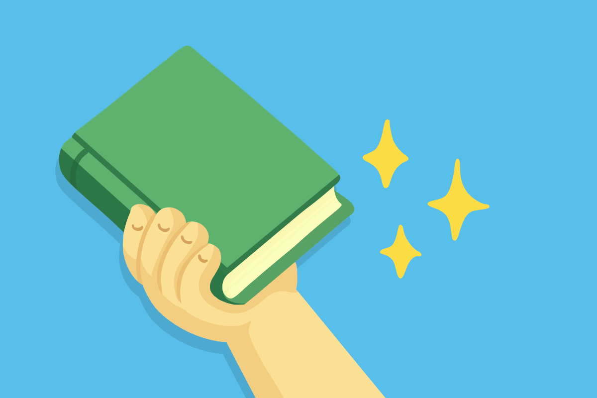 A hand holding a sparkling book
