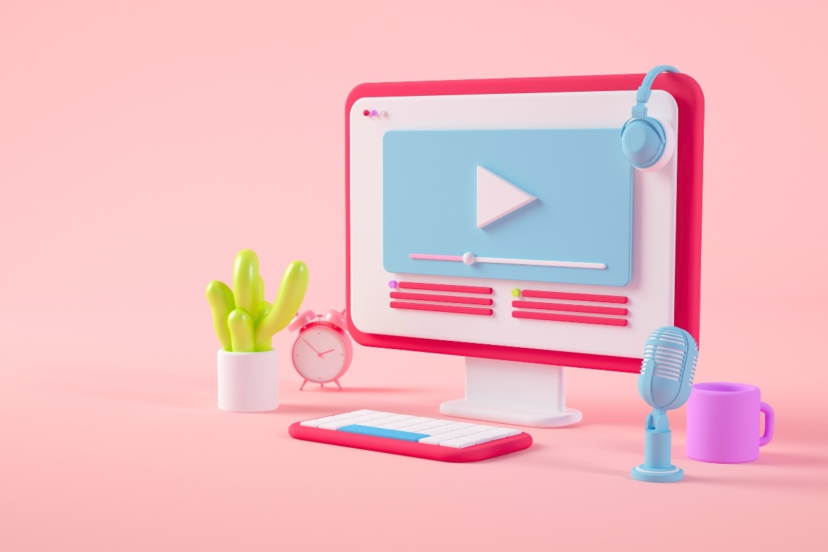 A graphic of a computer with a microphone and headphones