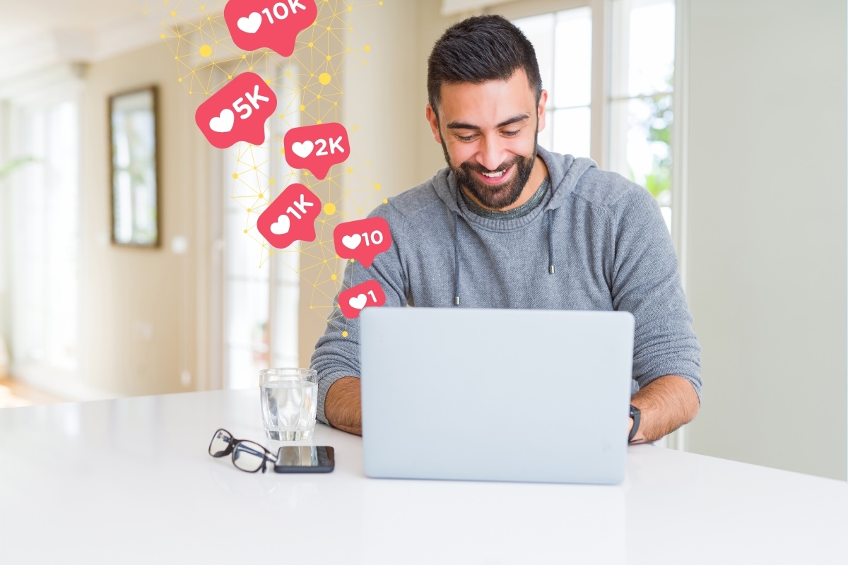 A person gains likes on a laptop