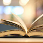 An open book on a table with its pages spread out