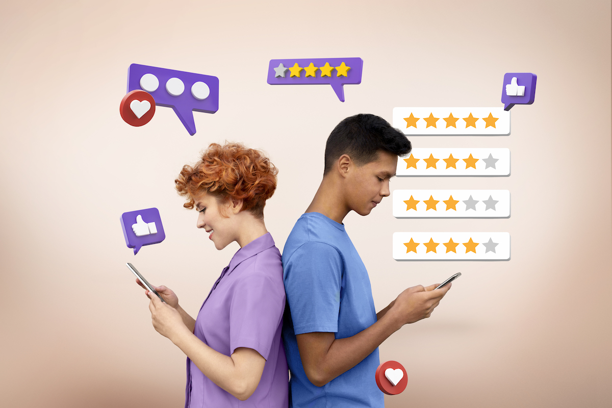 Two back-to-back people giving positive reviews on their phones