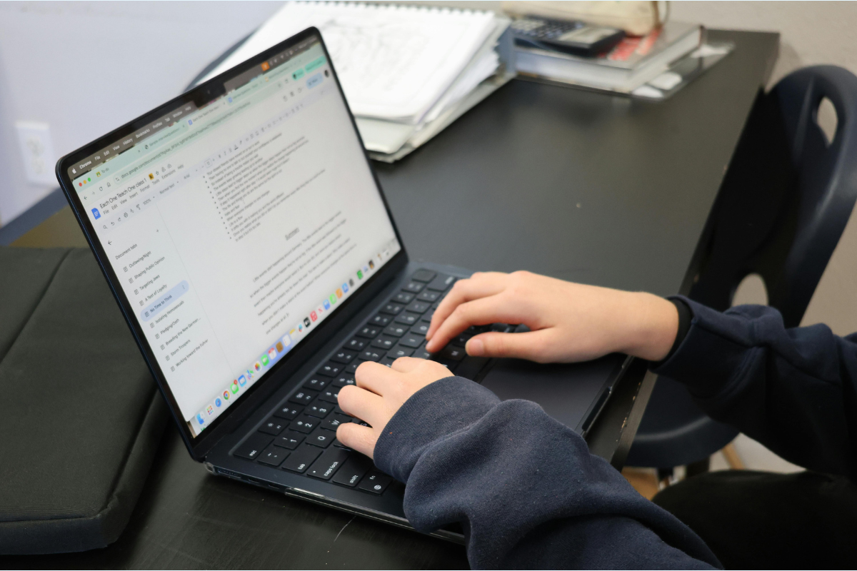 An editor making notes on a word document