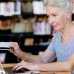 Reader browsing book recommendations while choosing a new book