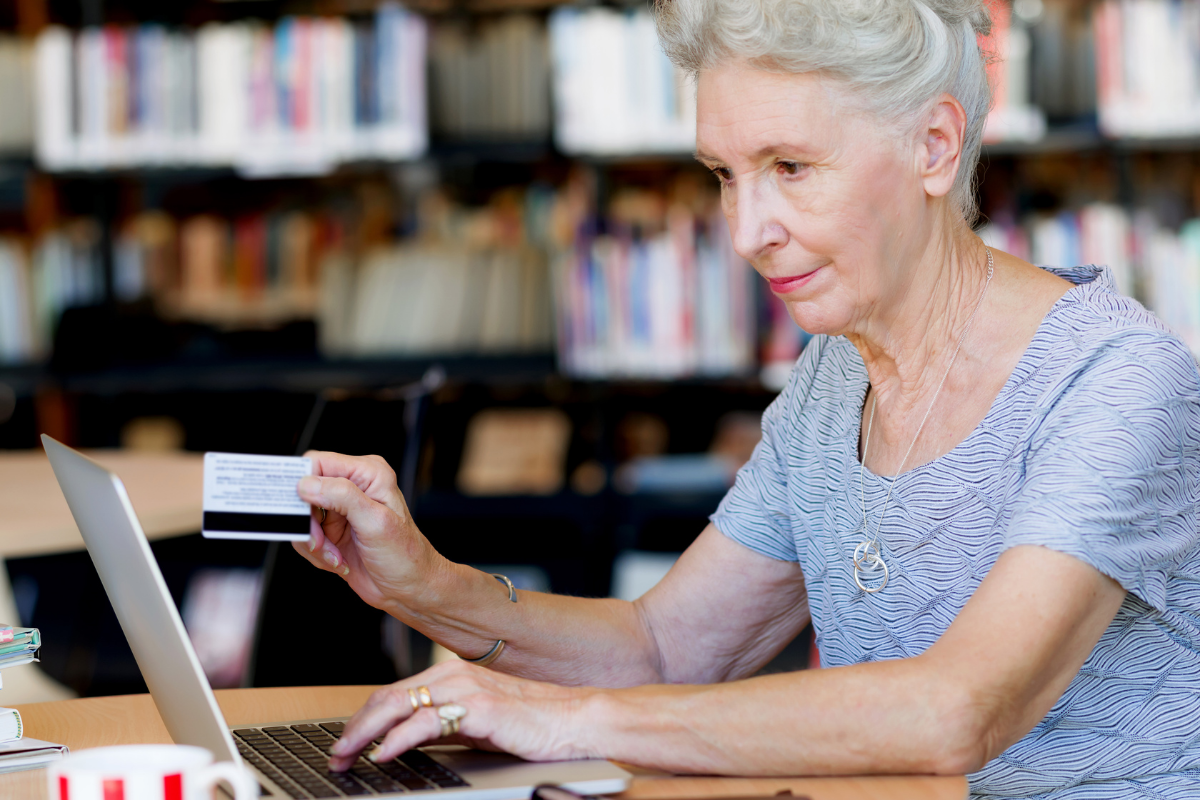 Reader browsing book recommendations while choosing a new book