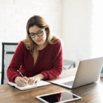 Author comparing reader outreach options while planning a book launch