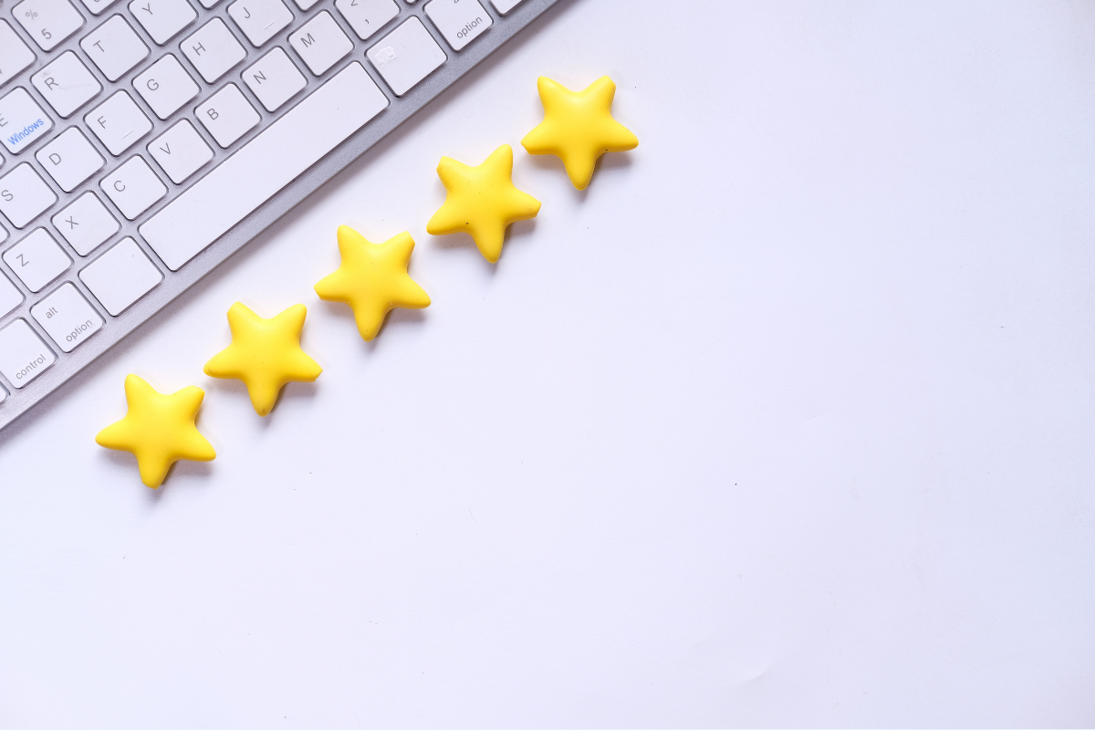 Five small stars lined up next to a keyboard