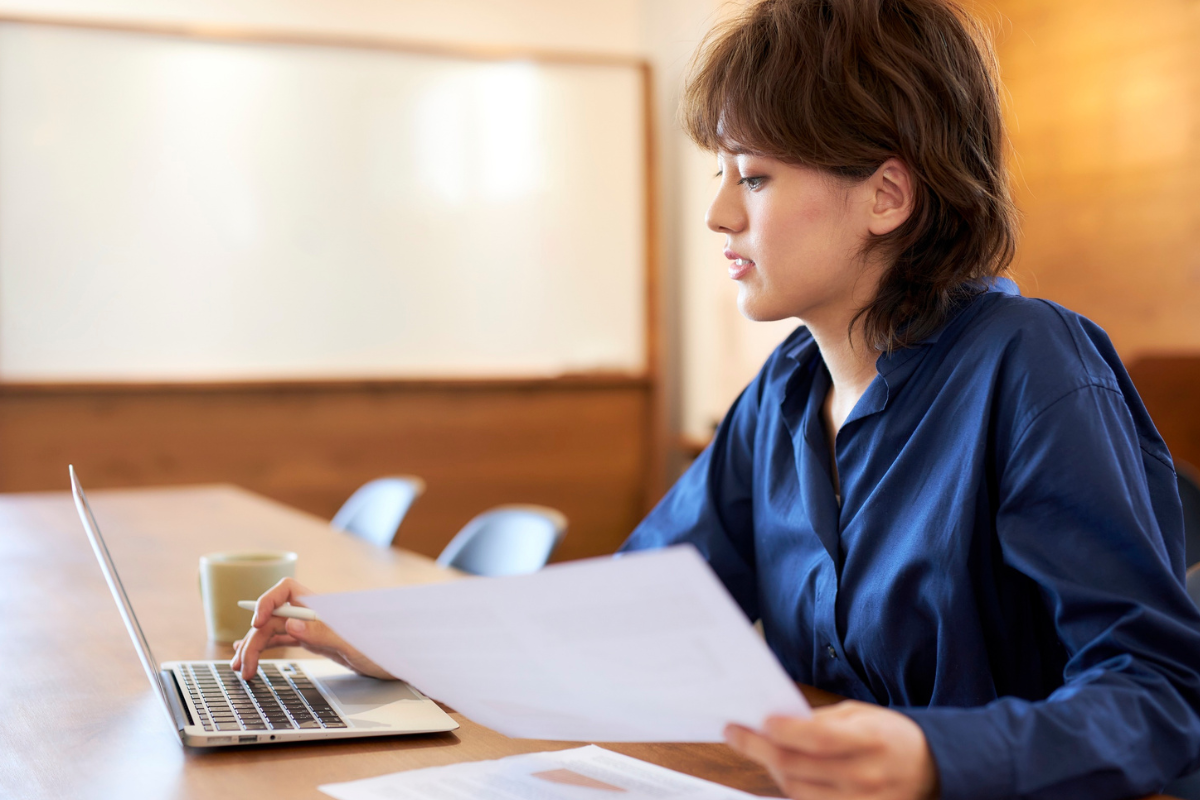 An author updating their profile on a laptop
