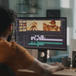 A video editor working on a computer