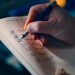 An author checks something off a to-do list