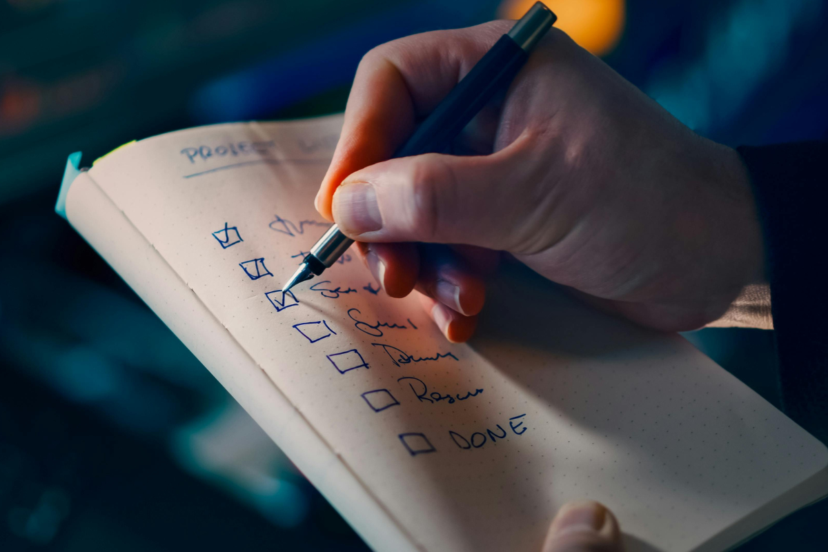 An author checks something off a to-do list