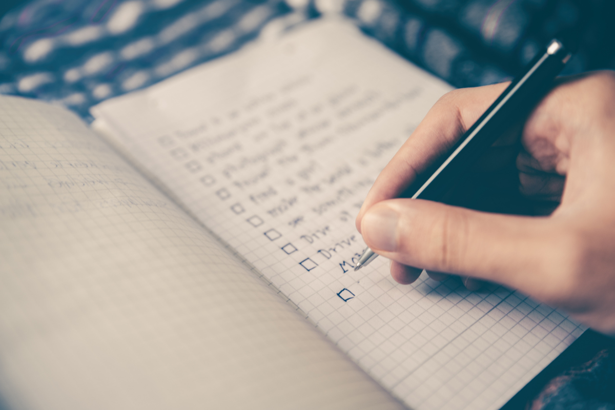 Ghostwriter preparation checklist with notes and comparable books