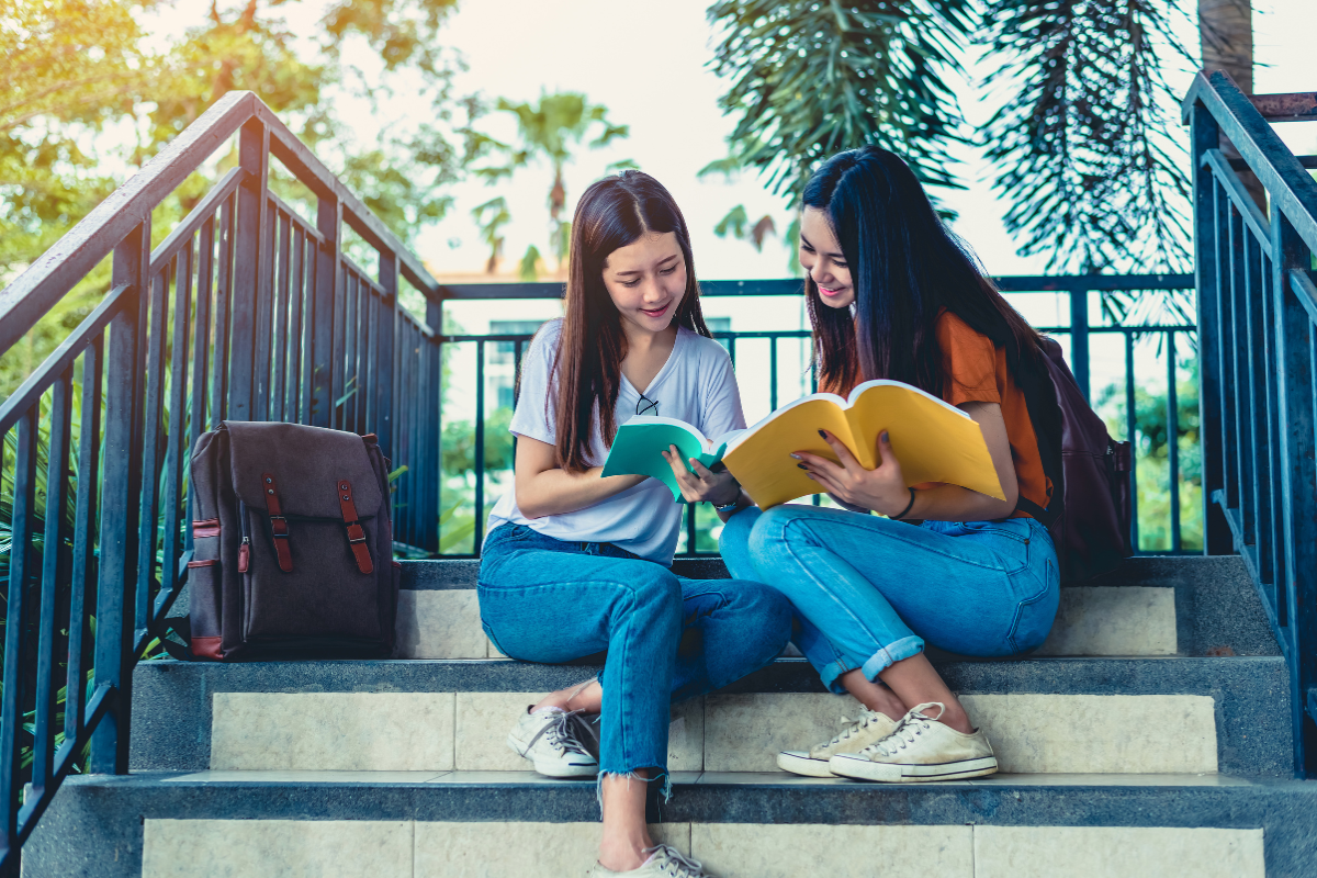 Author and ghostwriter reviewing notes for a book idea