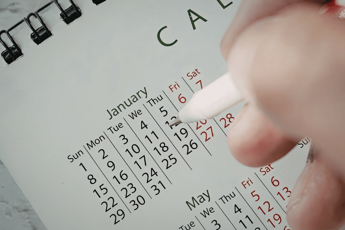 An author marks a calendar