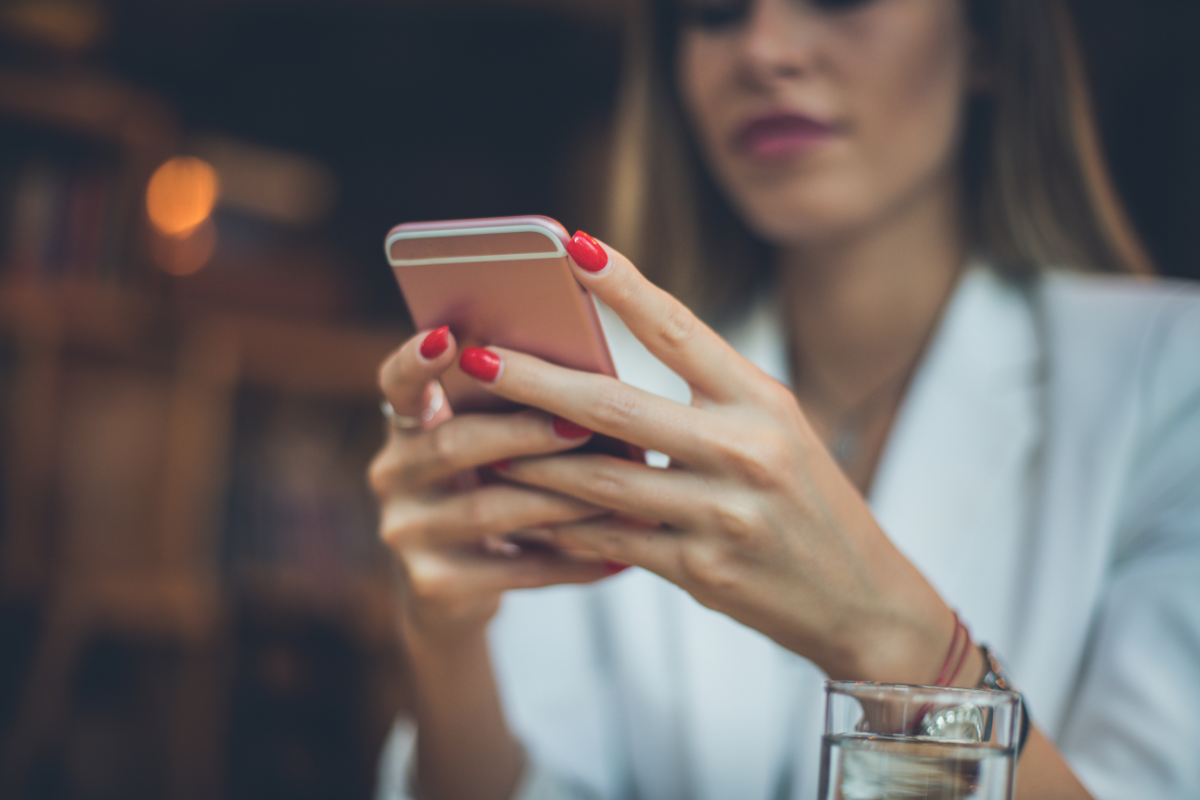 Reader saving a book to a digital reading list for later
